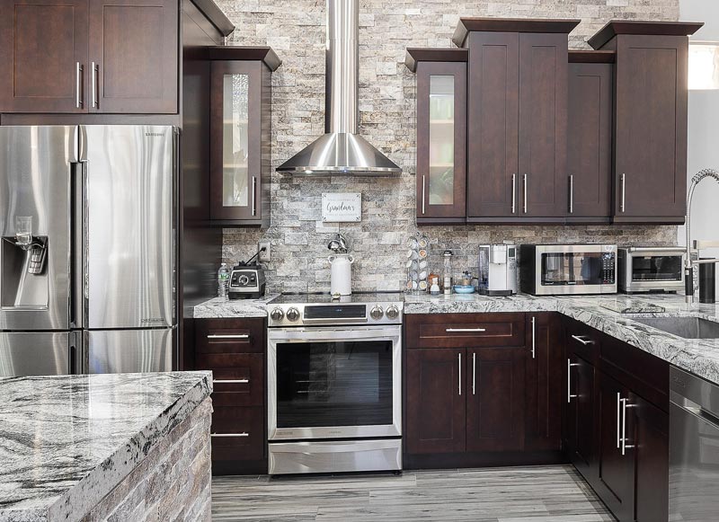 are dark kitchen cabinets in style?