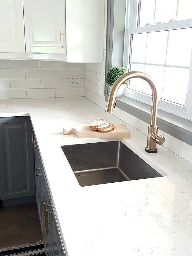 should kitchen faucet match cabinet hardware?