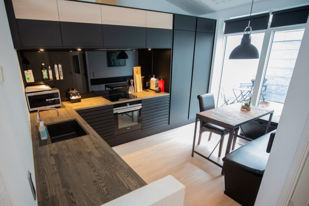 Stylish kitchen with wooden table