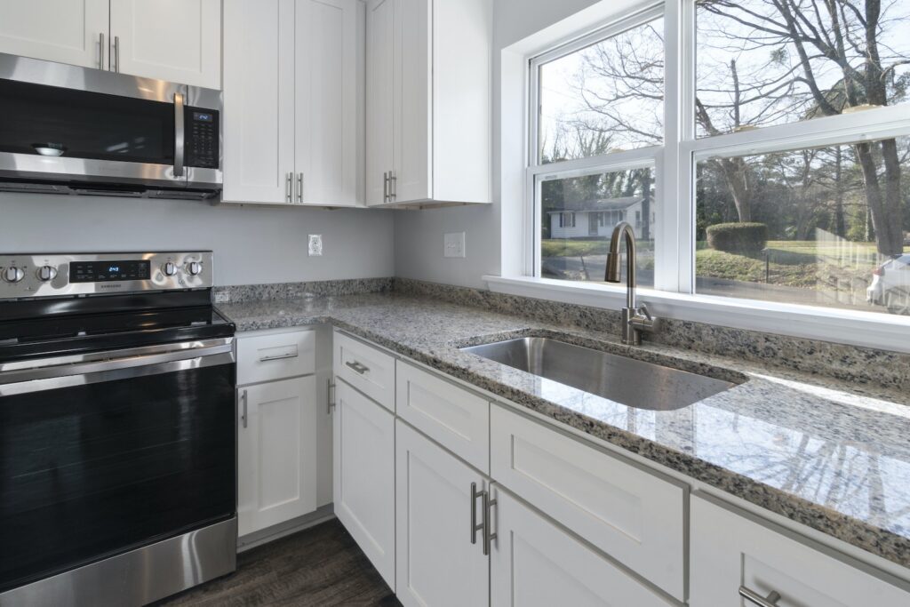 White Wooden Kitchen Cabinet With Stainless Steel Sink