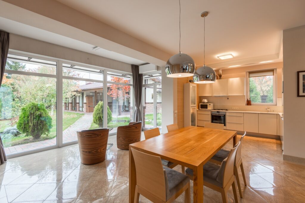 Spacious kitchen with dining zone and big windows